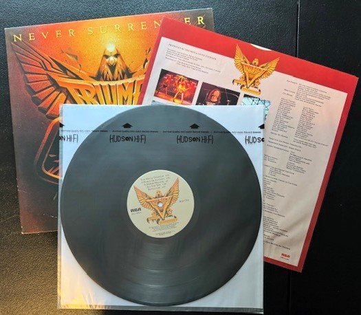 Triumph – Never Surrender (Used) - Maple City Music