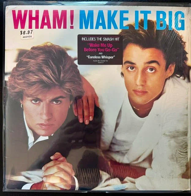 Vinyl album cover for 'Make It Big' by WHAM! featuring two men.